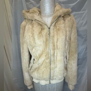 Vintage Juicy Couture size L tan fake fur bomber jacket.